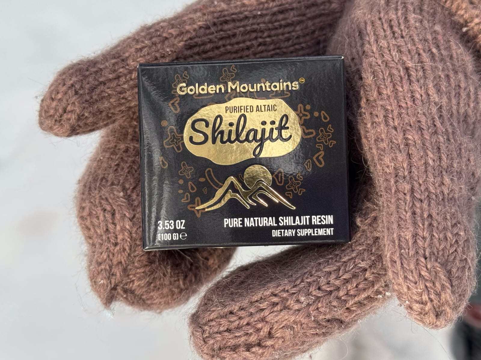 Shilajit "Golden Mountains"  in hands